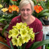 Carrie and a beautiful green clivia